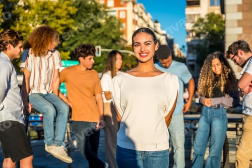 Preview: Beauty young woman standing smiling surrounded by friends at city