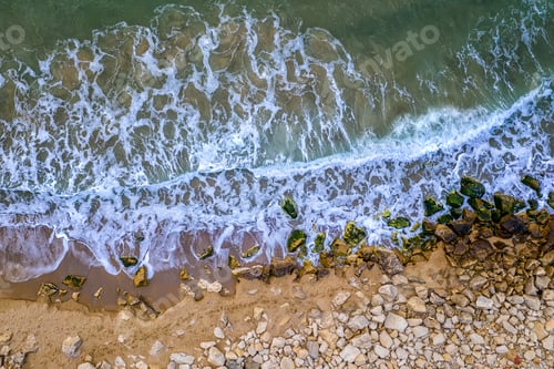 Ocean Waves Crashing on Rocky Shoreline