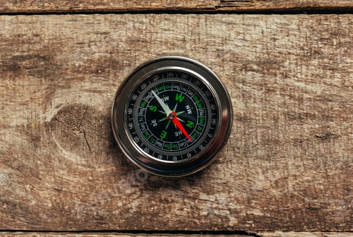 Preview: Compass on a wood deck