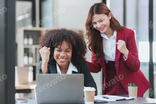 Preview: Two Young Women Celebrate Success at the Office