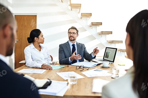 Preview: Working through his theory. Cropped shot of a group of businesspeople meeting in the boardroom.