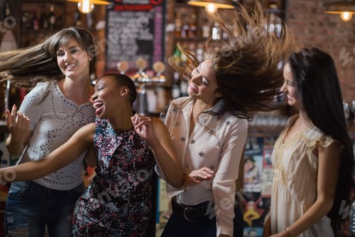 Preview: Carefree female friends dancing