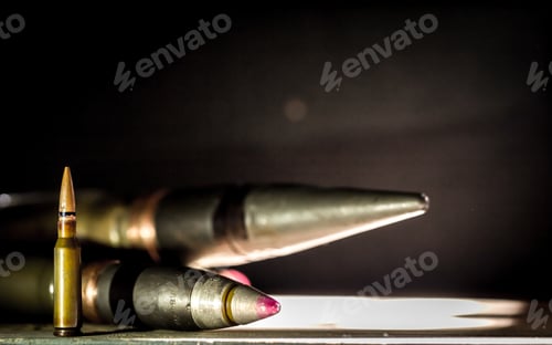 Preview: weapons, cartridge on wooden background