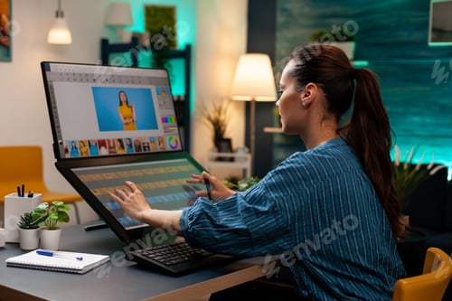 Preview: Photo editor artist doing touchpad work on retouching image