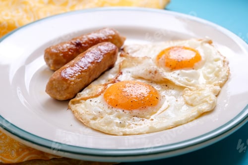 Preview: sunny side up organic eggs with sausages