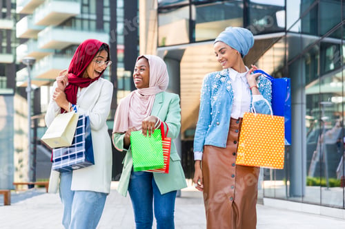 Preview: Beautiful muslim girl wearing hijab bonding outdoors