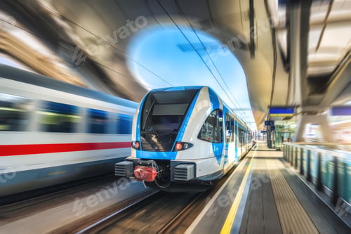 Preview: High-speed passenger train moving at railway station at sunset