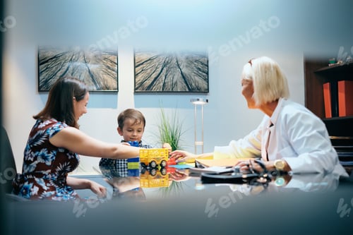 Preview: Happy Doctor Woman Working And Playing With Mom And Boy