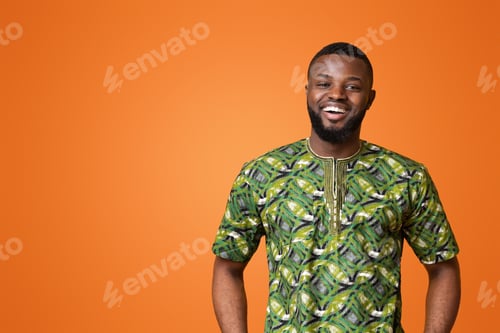 Preview: Confident african man posing over yellow background