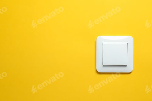 Preview: Modern plastic light switch on orange background. Space for text