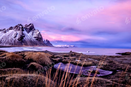 Preview: Mountains over beach and remote fields