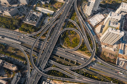 Preview: Aerial drone view of a traffic on a road junction in Wuhan on a sunny day