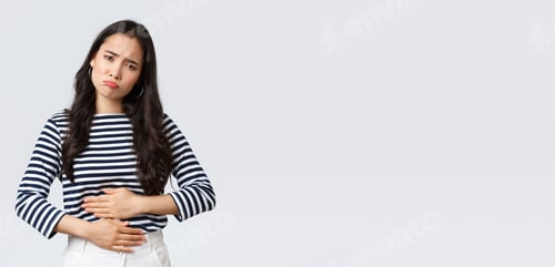 Preview: Lifestyle, beauty and fashion, people emotions concept. Woman got food poisoned, touching belly