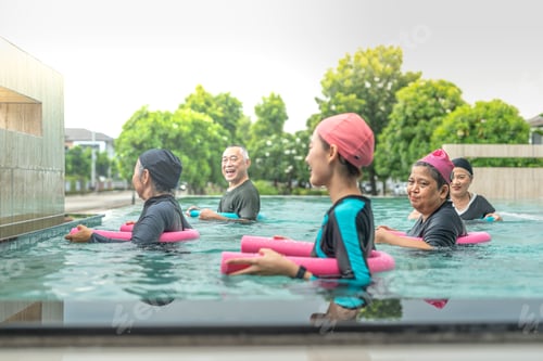 Preview: senior aquatic class practicing water relaxation and float