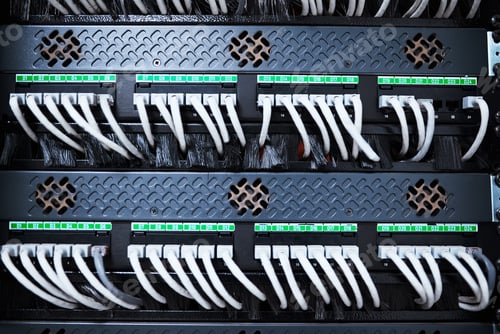 Preview: Cropped shot of the inside of a computer with all of its wiring located in a server room