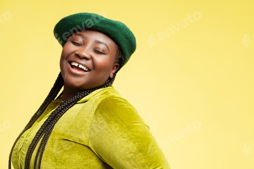 Preview: Portrait happy African woman wearing stylish outfit isolated on background. Body positive