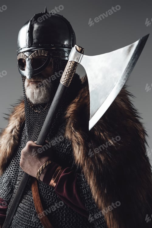 Preview: Side view studio shot of old man viking with axe