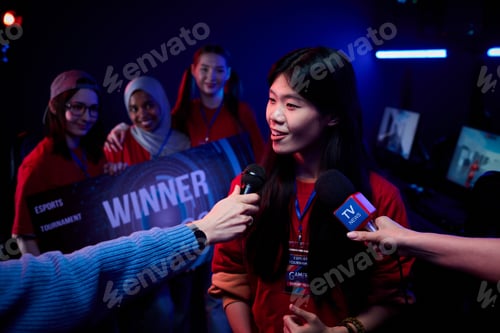 Preview: Asian Teenage Girl Gamer Team Celebrating Winning Esports Tournament Interview