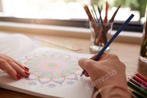 Preview: Human hands drawing in adult coloring book
