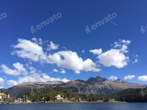 Preview: Beautiful sky over the lake of St Moritz, Switzerland.