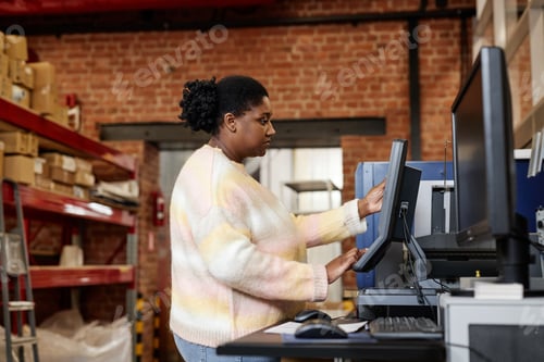 Preview: Female Worker in Printshop Side View