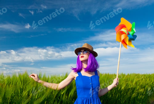Preview: young woman with wind toy