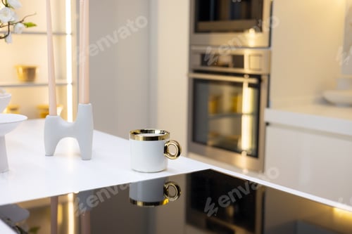 Preview: White mug in morning time at kitchen background.