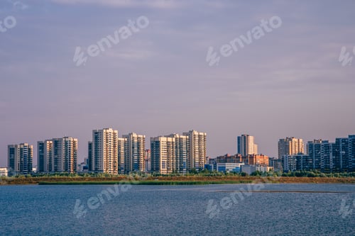 Preview: Urban landscape on river bank.