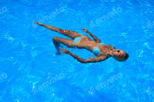 Preview: woman in a pool