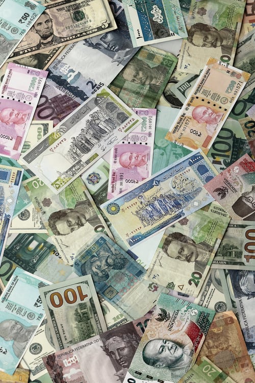 Preview: Colorful Collage of Global Currencies and Banknotes