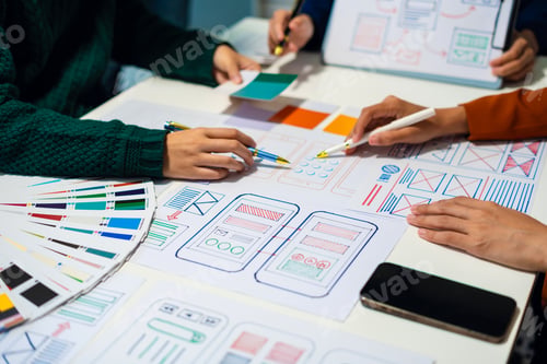 Preview: UX developer and ui designer brainstorming about mobile app interface wireframe design