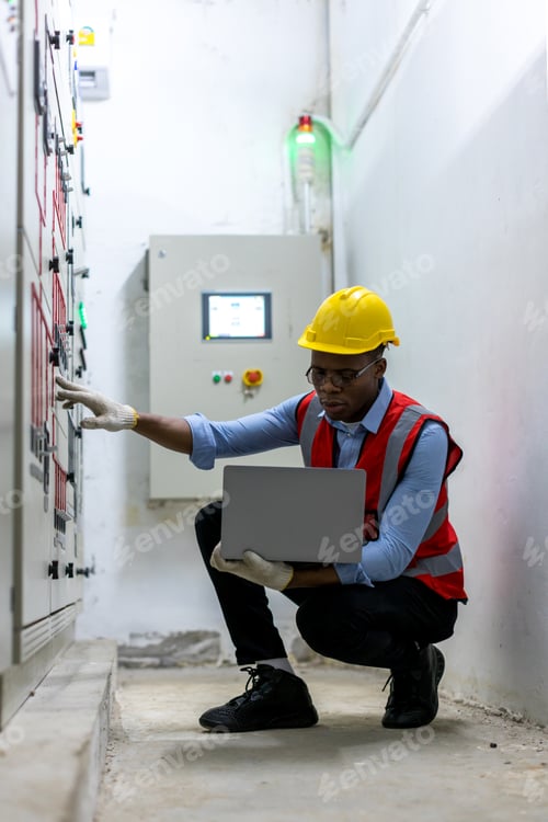 Preview: Electrical engineer working in control room.