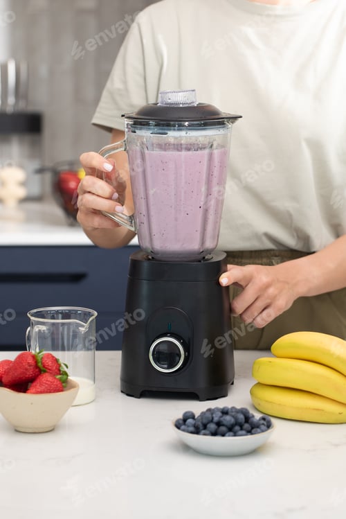 Preview: Making a fresh berry smoothie in modern kitchen setting for healthy lifestyle inspiration