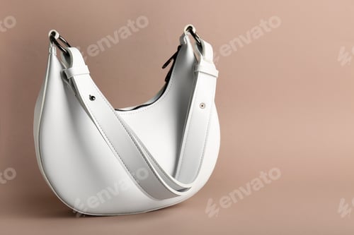 Preview: Stylish woman's bag on beige background. Space for text