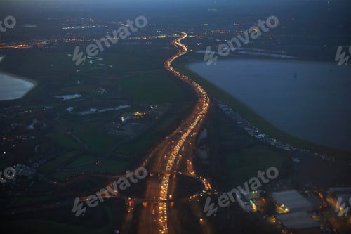 Preview: High angle view of Heathrow airport and M25 illuminated at night, London, United Kingdom, Europe