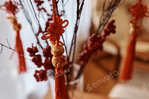 Preview: Close up of decoration on pussy willow branch for celebration of Chinese Year of the Rabbit.