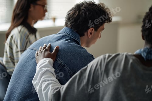 Preview: Diverse Teenagers Supporting Each Other during Counseling Session Indoors