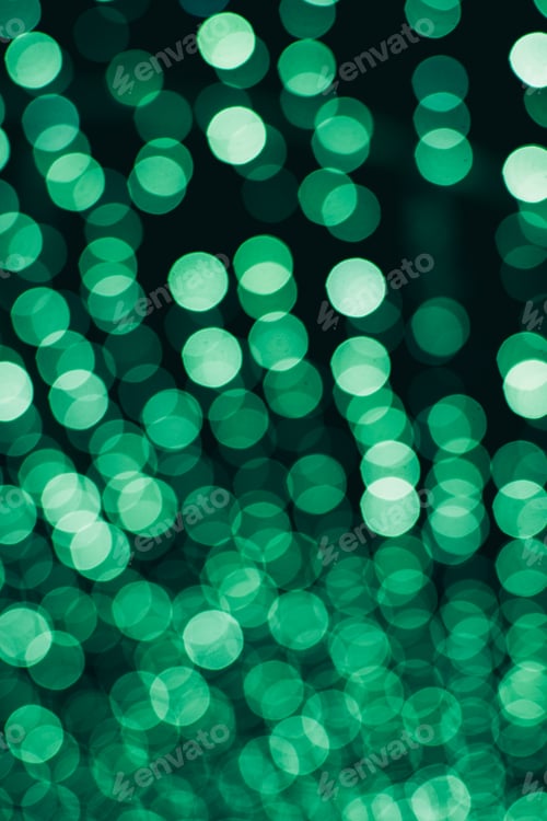 Preview: Green abstract background of blue bokeh defocused blurred lights