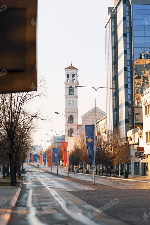 Preview: the street has buildings along it with white pillars and white lines