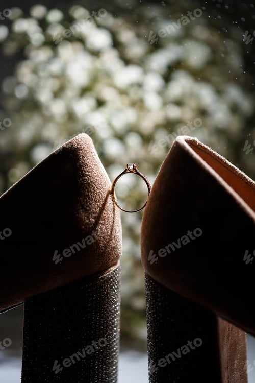 Preview: Bride's engagement ring on wedding day with beautiful holiday shoes