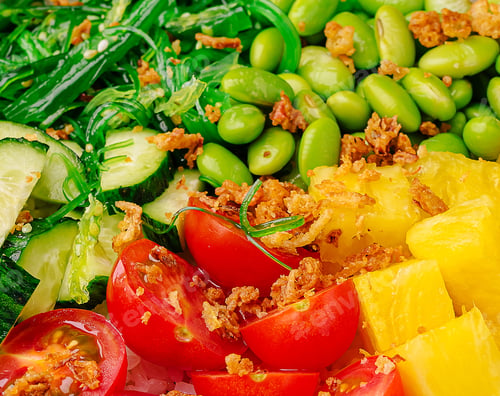 Preview: Colorful salad bowl with fresh vegetables and fruits served at lunch