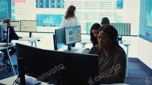 Preview: Financial consultant studying annual sales reports and infographics