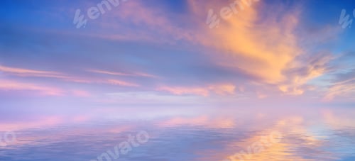 Preview: Colorful Sunrise Sky Reflected in Ocean Water