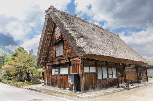 Preview: Typical traditional thick gassho zukuri style roof in Shirakawago in Japan during springtime.