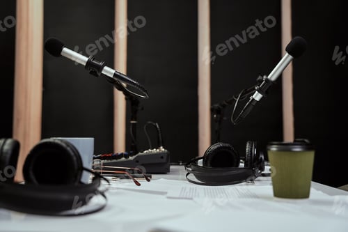 Preview: Working place of radio host. Close up of microphones, headphones and sound mixing desk on