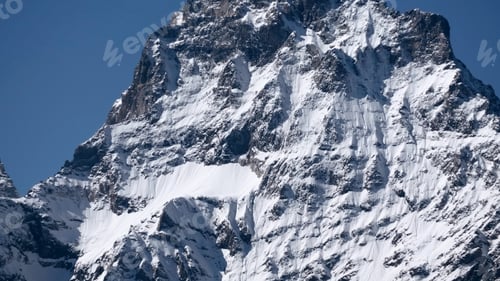 Preview: Fairytale mountain landscape, covered by ice and snow alpine sharp peaks. Creative. Wild winter