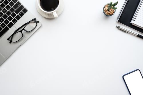 Preview: Top view creative workspace, smartphone glasses keyboard white table copy space.