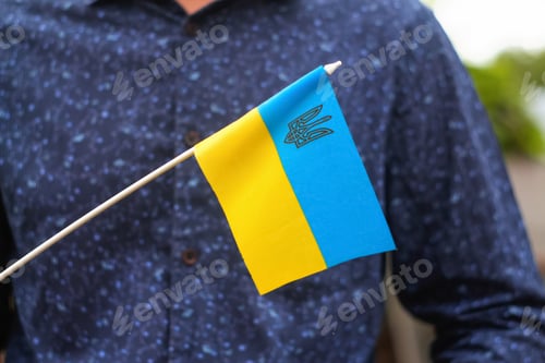 Preview: Photography of flag of Ukraine. Close up waving flag of Ukraine and emblem. Flag symbol of Ukraine.
