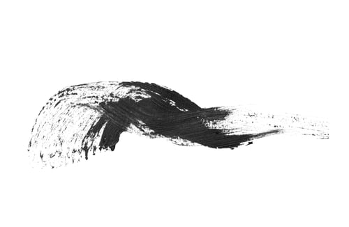 Preview: Smear of black mascara for eyelashes on white background