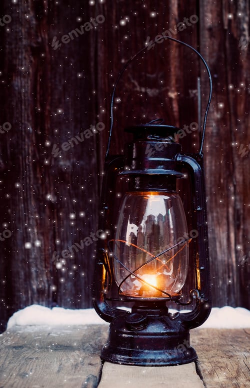 Preview: christmas lantern and bauble on vintage wooden background in night